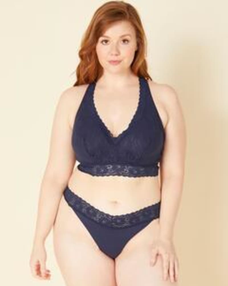 Front of a model wearing a size 1X Lace Mid-Rise Thong in Navy Blue by Cosabella. | dia_product_style_image_id:253607